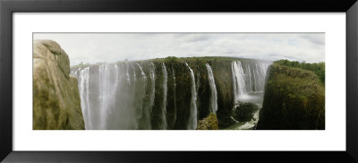 Water Falling Into A River, Victoria Falls, Zimbabwe, Africa by Panoramic Images Pricing Limited Edition Print image