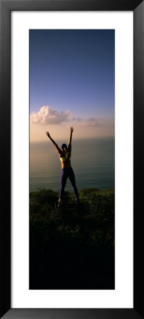 Young Woman Exercising On A Hill by Panoramic Images Pricing Limited Edition Print image