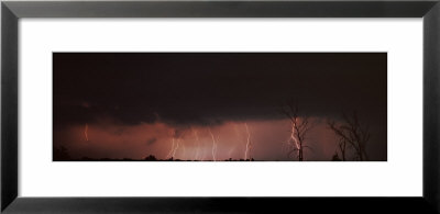 Forked Lightning Under Dramatic Cloud Striking Over A Field by Panoramic Images Pricing Limited Edition Print image