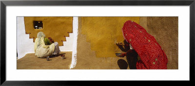Two Women Painting On A Wall, Khuri, Thar Desert, Jaisalmer, Rajasthan, India by Panoramic Images Pricing Limited Edition Print image