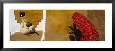 Two Women Painting On A Wall, Khuri, Thar Desert, Jaisalmer, Rajasthan, India by Panoramic Images Pricing Limited Edition Print image