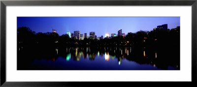 Skyscrapers In A City, Central Park Lake, New York, Usa by Panoramic Images Pricing Limited Edition Print image