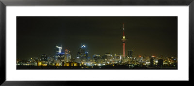 Buildings Lit Up At Night, Sky Tower, Auckland, New Zealand by Panoramic Images Pricing Limited Edition Print image