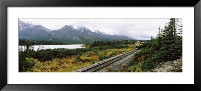 Railroad Track Passing Through A Landscape, Yukon Railroad, Summit Lake, White Pass, Alaska, Usa by Panoramic Images Pricing Limited Edition Print image