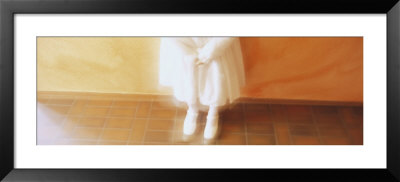 High Angle View Of A Girl Standing In Front Of A Wall, Germany by Panoramic Images Pricing Limited Edition Print image