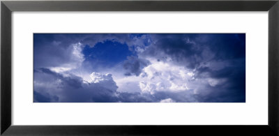 Low Angle View Of Cumulus Cloud In The Blue Sky by Panoramic Images Pricing Limited Edition Print image