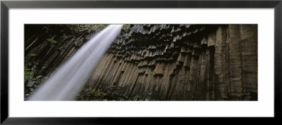 Water Flowing From The Cliff, Svartifoss Waterfall, Skaftafell National Park, Iceland by Panoramic Images Pricing Limited Edition Print image