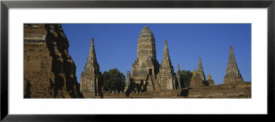 Low Angle View Of Buildings Of A Temple, Wat Chaiwatthanaram, Ayuthaya, Thailand by Panoramic Images Pricing Limited Edition Print image