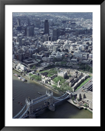 Aerial Of Tower Bridge, Tower Of London And The City Of London, London, England by Adam Woolfitt Pricing Limited Edition Print image