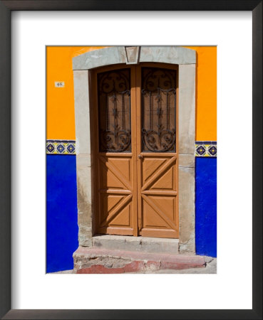 Ornate Wooden Door On Colorful Wall, Guanajuato, Mexico by Julie Eggers Pricing Limited Edition Print image