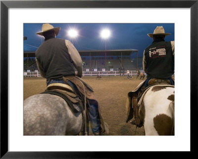 Cowboys On Horseback At Cody Night Rodeo, Cody, Wyoming by Lee Foster Pricing Limited Edition Print image