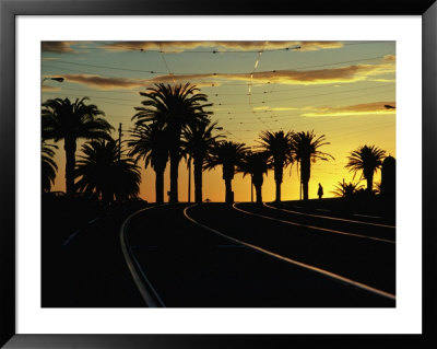 Sunset On Tram Tracks Of St. Kilda Esplanade, Melbourne, Australia by John Banagan Pricing Limited Edition Print image