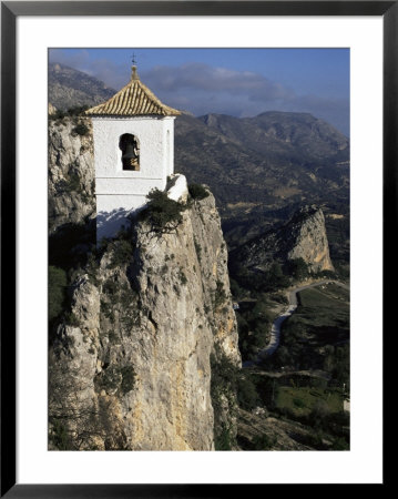 Bell Tower In Village Built On Limestone Crag, Guadalest, Costa Blanca, Valencia Region, Spain by Tony Waltham Pricing Limited Edition Print image