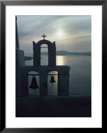 A Bell Tower Silhouetted Against The Sea Of Crete At Sunset by Anne Keiser Pricing Limited Edition Print image