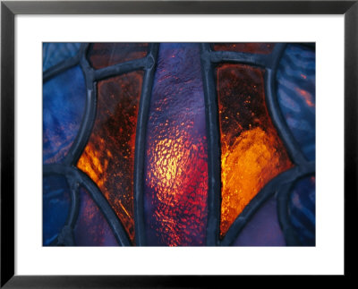 Sunset Illuminates A Stained Glass Window Of A Church by Raymond Gehman Pricing Limited Edition Print image