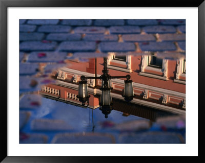 Puddle On Cobblestones Reflecting Building, Nyiregyhaza, Hungary by Martin Moos Pricing Limited Edition Print image