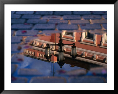 Puddle On Cobblestones Reflecting Building, Nyiregyhaza, Hungary by Martin Moos Pricing Limited Edition Print image