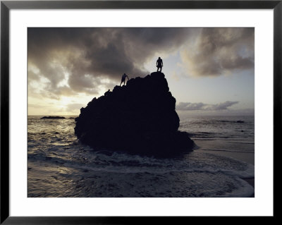 A Huge Rock In Waimea Bay Is A Popular Climbing Spot by Chris Johns Pricing Limited Edition Print image