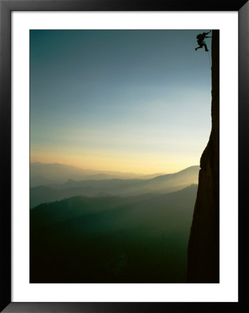 A Rock Climber From The 90 Degree Face Of A Mountain Wall by Barry Tessman Pricing Limited Edition Print image