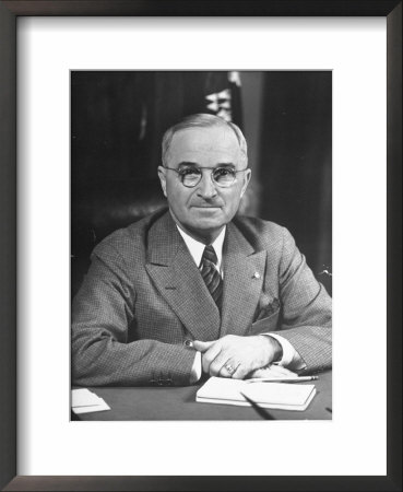 Harry S. Truman Sitting At Desk by Marie Hansen Pricing Limited Edition Print image