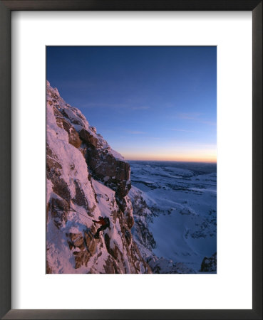 A Man Rappels Down A Mountain In Grand Teton National Park by Jimmy Chin Pricing Limited Edition Print image