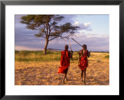 Two Maasai Morans Walking With Spears At Sunset, Amboseli National Park, Kenya by Alison Jones Pricing Limited Edition Print image