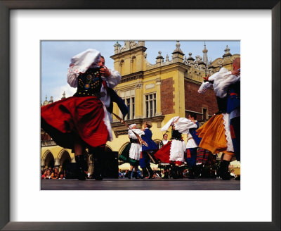 Folk Dancers In Old Market Square, Krakow, Malopolskie, Poland by Krzysztof Dydynski Pricing Limited Edition Print image