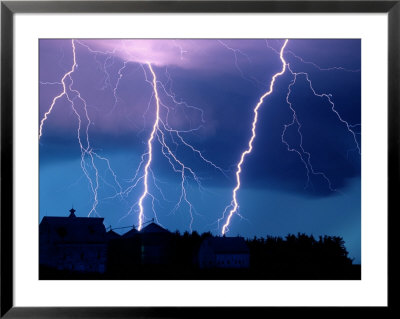 Lightning Fills The Night Sky Near Walton by Joel Sartore Pricing Limited Edition Print image
