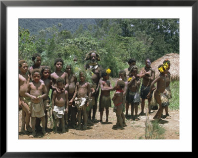 Portrait Of A Huli Man And Group Of Children Highlands, Papua New Guinea by Sybil Sassoon Pricing Limited Edition Print image