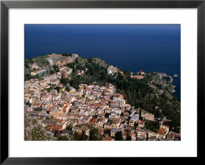 Aerial View Of Coastal Town Including Teatro Greco (Greek Ampitheatre), Taormina, Sicily, Italy by Stephen Saks Pricing Limited Edition Print image
