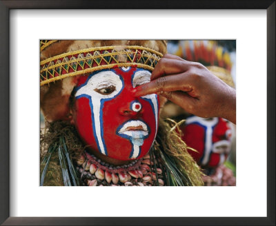 A Tribal Woman Clad With Shell Necklaces And Bright Face Paint by Jodi Cobb Pricing Limited Edition Print image