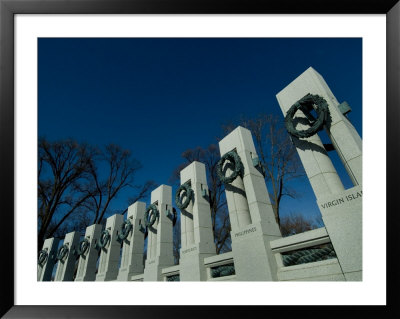 Pillars Adorned With Bronze Wreaths At World War Ii Memorial by Todd Gipstein Pricing Limited Edition Print image