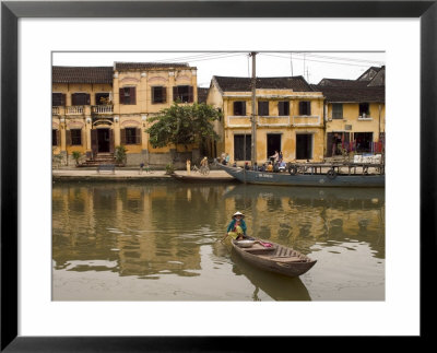 Boat On River In Front Of Yellow Coloured Colonial Buildings, Hoi An, Vietnam, Southeast Asia by Christian Kober Pricing Limited Edition Print image