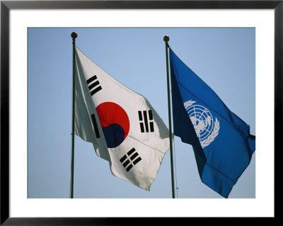 The Flags Of South Korea And The United Nations Wave In The Breeze by Michael S. Yamashita Pricing Limited Edition Print image