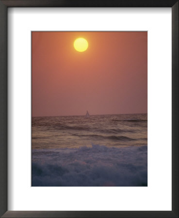 Surf Breaks On A Beach At Sunset by Raul Touzon Pricing Limited Edition Print image