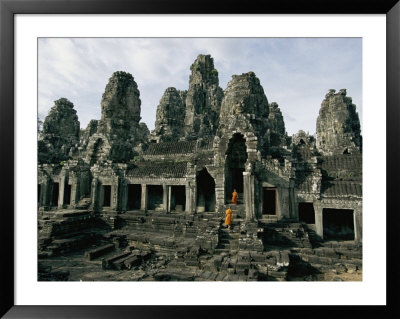 Monks In Orange Robes Stand On The Step Outside A Buddhist Temple by Paul Chesley Pricing Limited Edition Print image