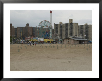 Looking Across The Beach To The Ferris Wheel At Coney Island, Brooklyn, New York by Todd Gipstein Pricing Limited Edition Print image