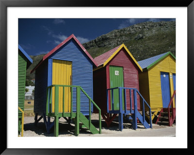 Colorful Changing Huts Line A South African Beach On The Cape by Tino Soriano Pricing Limited Edition Print image