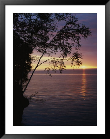 The Sun Sets On Lake Superior In The Apostle Islands by Raymond Gehman Pricing Limited Edition Print image