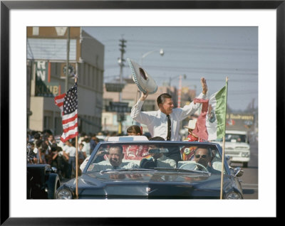 Republican Gubernatorial Candidate Ronald Reagan Waving In Convertible Car While On Campaign Trail by Bill Ray Pricing Limited Edition Print image