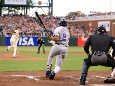 Texas Rangers V San Francisco Giants, Game 1: Vladimir Guerrero, Tim Lincecum by Ezra Shaw Pricing Limited Edition Print image