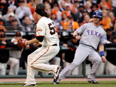 Texas Rangers V San Francisco Giants, Game 1: Tim Lincecum, Michael Young by Jed Jacobsohn Pricing Limited Edition Print image