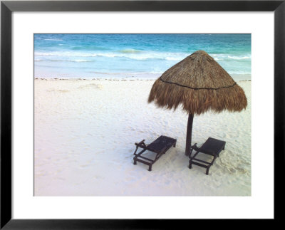 A Palm Frond Umbrella And Two Chairs On A White Sand Beach by Raul Touzon Pricing Limited Edition Print image