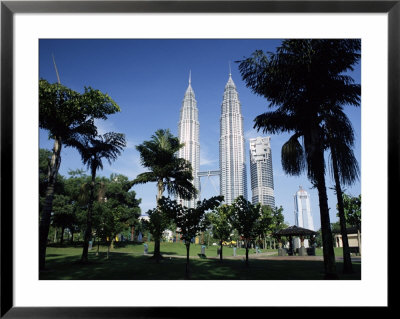 Petronas Twin Towers Seen From Public Park, Kuala Lumpur, Malaysia, Southeast Asia by Charcrit Boonsom Pricing Limited Edition Print image