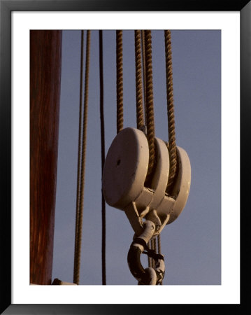 Giant Nautical Pulleys Help Leverage Heavy Sails On A Sailing Ship by Stephen St. John Pricing Limited Edition Print image