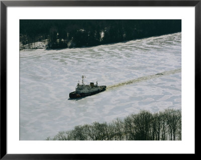 A U.S. Coast Guard Boat Breaks Its Way Through The Icy River by Heather Perry Pricing Limited Edition Print image