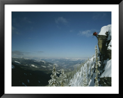 Rappeling With Snowboard, Red Mountain, British Columbia by Mark Cosslett Pricing Limited Edition Print image