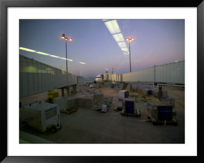 An Airport Ramp And Airplane At Dusk And Reflections On A Windowpane by Raul Touzon Pricing Limited Edition Print image