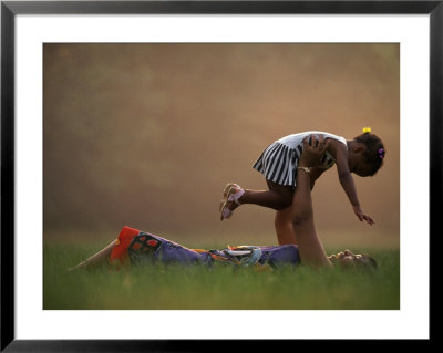 Mother And Daughter Playing In Grass by Frank Siteman Pricing Limited Edition Print image