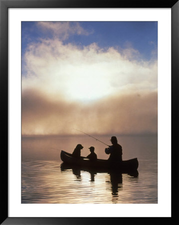Silhouetted Father And Son Fishing From A Canoe by Bob Winsett Pricing Limited Edition Print image